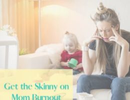 Mom with head in hands while daughter plays in the background