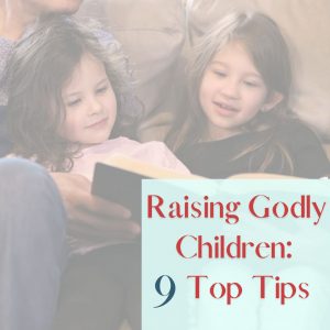 Raising Godly Children feature image of 2 girls with a Bible held in front of them by an unseen parent.