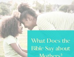 What does the Bible say about mothers feature image of a native american mom holding her daughter's hands. They have their foreheads touching and are both smiling.