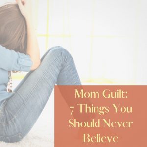 Mom guilt feature image of woman sitting on floor with knees up and head in hands