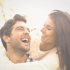 Encourage your husband feature image of man and woman laughing together